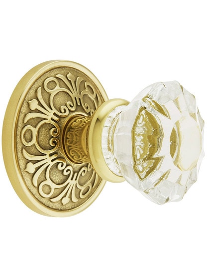 Lancaster Door Set With Fluted Crystal Knobs in Polished Brass.